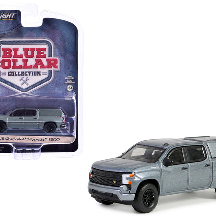 2023 Chevrolet Silverado 1500 Pickup Truck with Camper Shell Sterling Gray Metallic "Blue Collar Collection" Series 13 1/64 Diecast Model Car by Greenlight