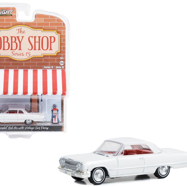 1963 Chevrolet Bel Air White with Orange Interior and Vintage Gas Pump "The Hobby Shop" Series 15 1/64 Diecast Model Car by Greenlight