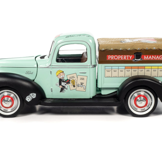 1940 Ford Pickup Truck "Property Management" Light Green with Graphics and Mr. Monopoly Construction Resin Figure "Monopoly" 1/18 Diecast Model Car by Auto World