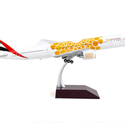 Boeing 777-300ER Commercial Aircraft "Emirates Airlines - Dubai Expo 2020" White with Orange Graphics "Gemini 200" Series 1/200 Diecast Model Airplane by GeminiJets