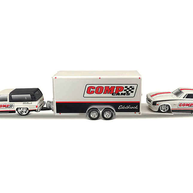 1979 Chevrolet K5 Blazer White and Black and 1968 Chevrolet Camaro Z/28 White with Stripes with Enclosed Car Trailer "Comp Cams - Edlebrock" "Team Haulers" Series 1/64 Diecast Model Car by Maisto