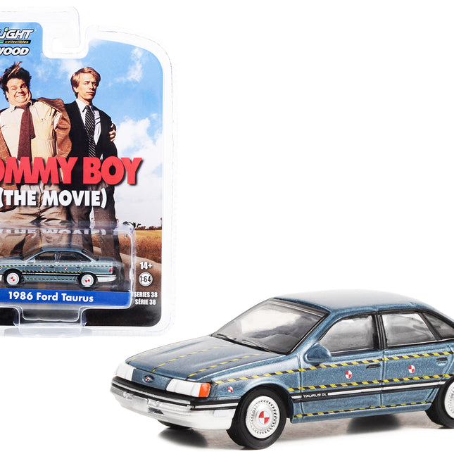 1986 Ford Taurus Blue Metallic "Zalinsky Auto Parts" Crash Test Vehicle "Tommy Boy" (1995) Movie "Hollywood Series" Release 38 1/64 Diecast Model Car by Greenlight